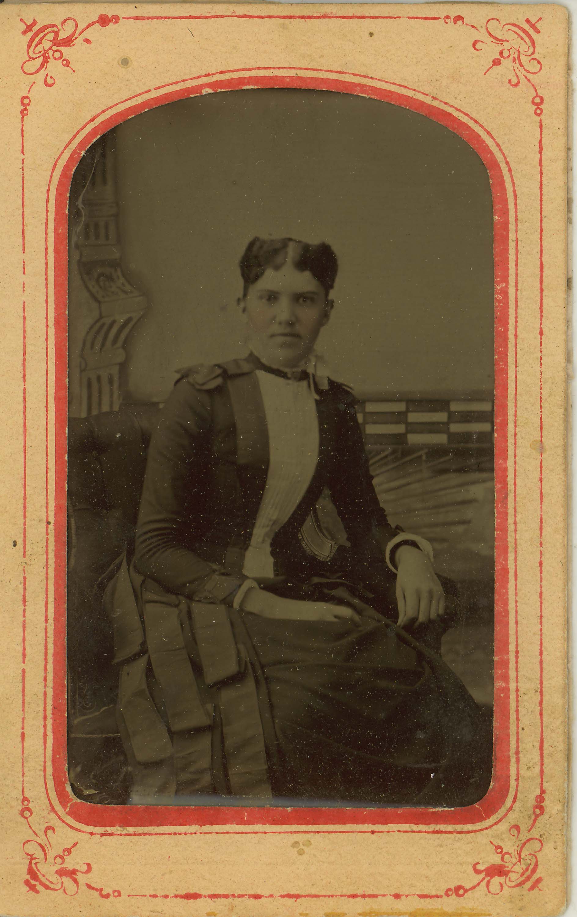 Tin-type-15-Portrait-of-seated-woman-mounted-in-arched-pink-and-red-matt