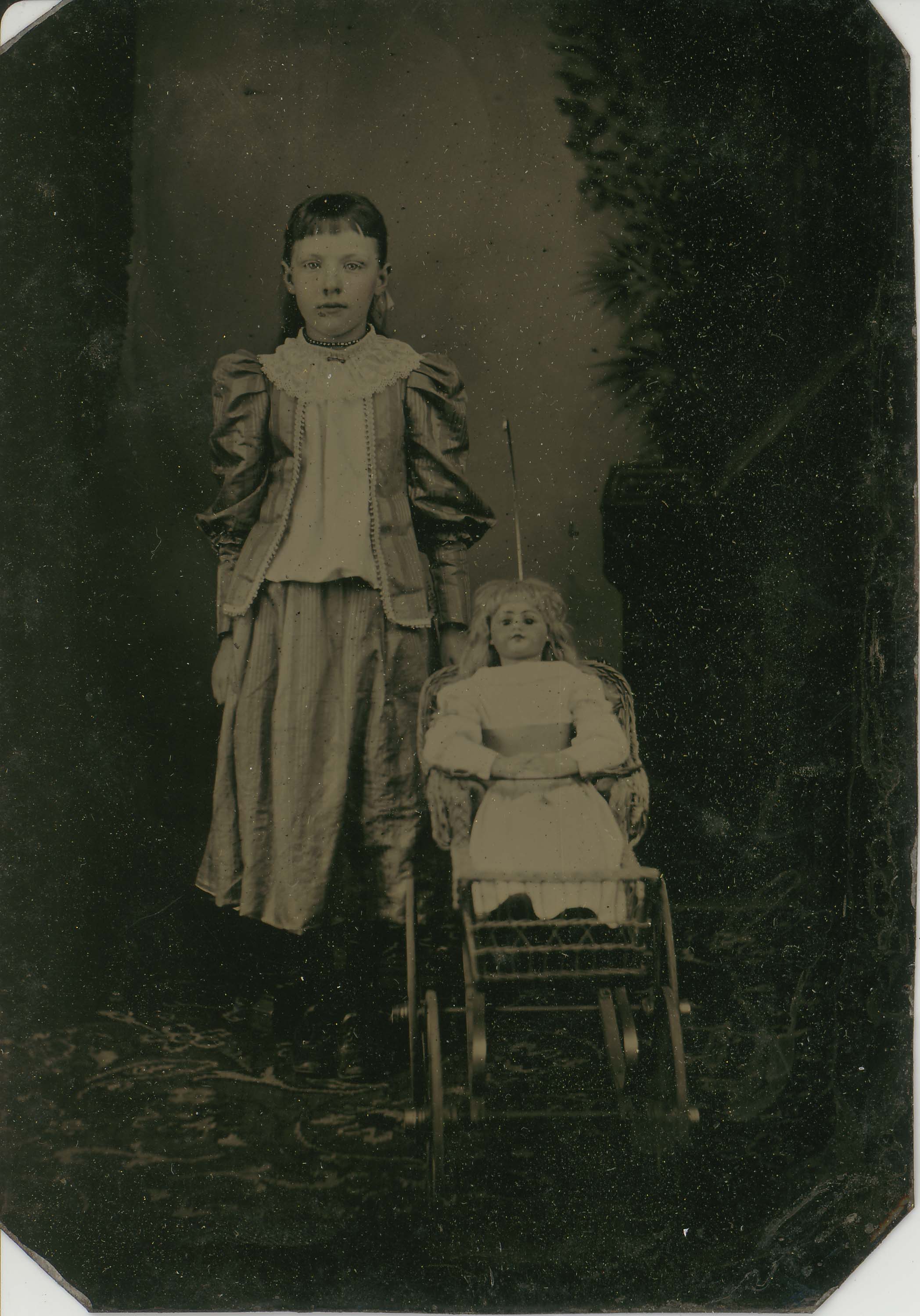 Tin-type-5-Girl-with-doll-in-wicker-pram