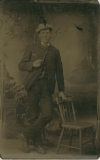 Tin-type-8-Man-in-White-hat-leaning-on-chair